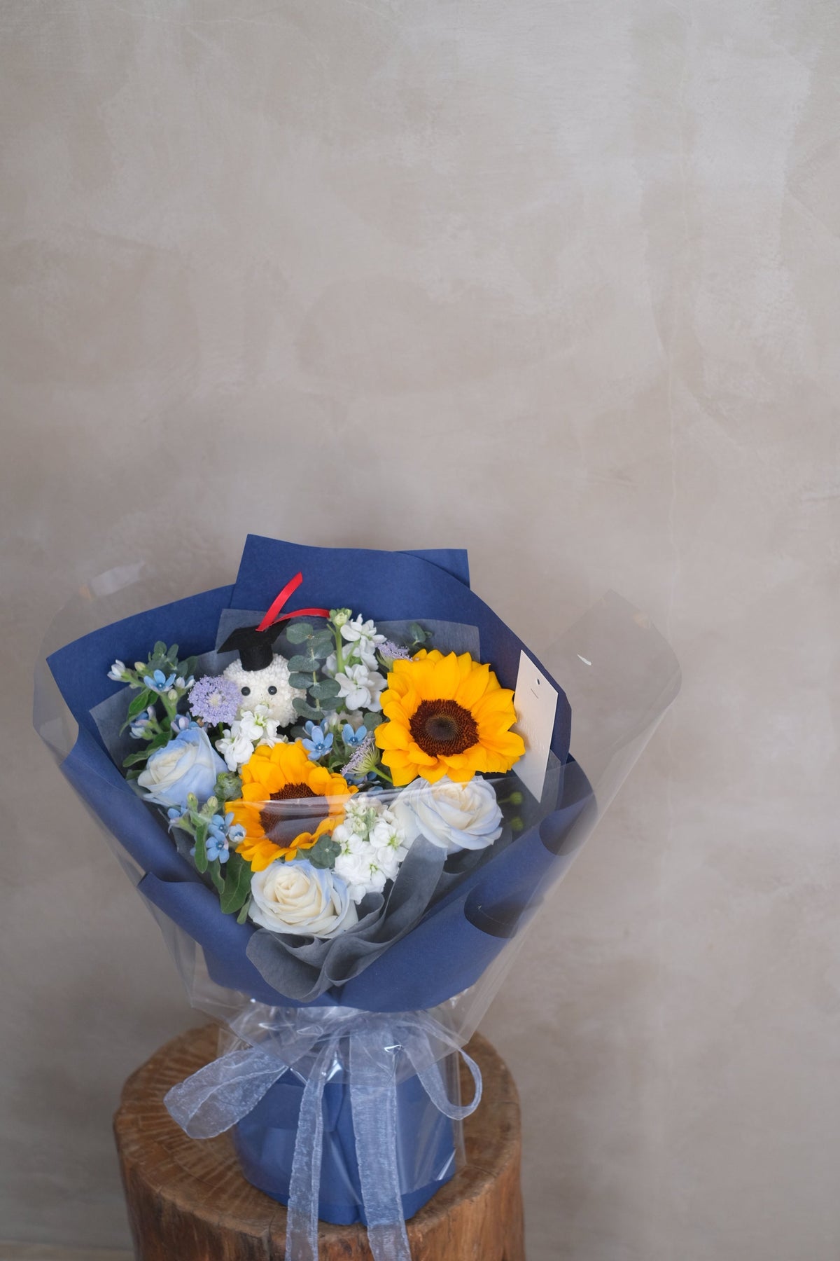 Caps & Blooms Bouquet by Bamboo Green Florist, Penang
