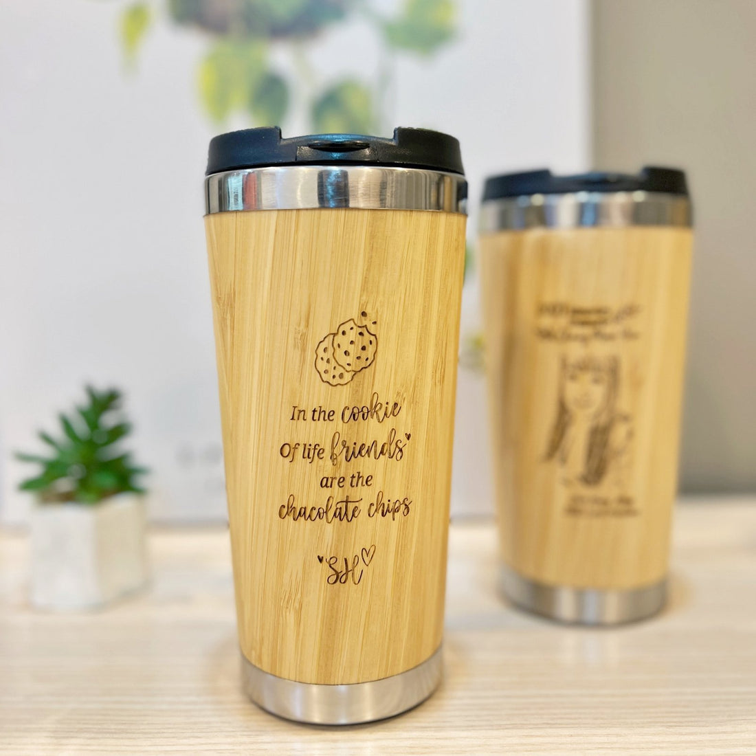Personalised bamboo coffee mugs with engraved quote and portrait designs, By Glee