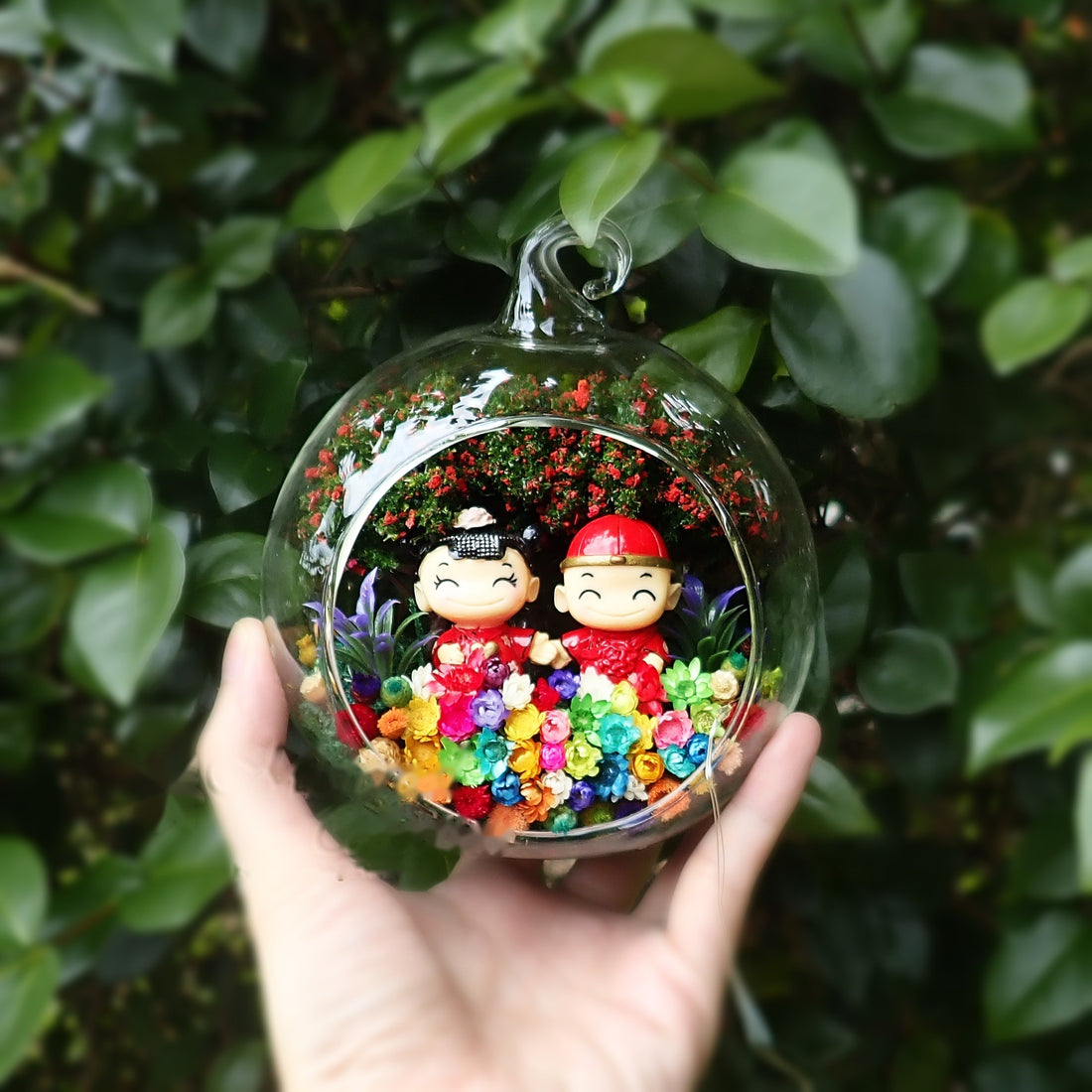 Couple in Traditional Hats preserved flower terrarium