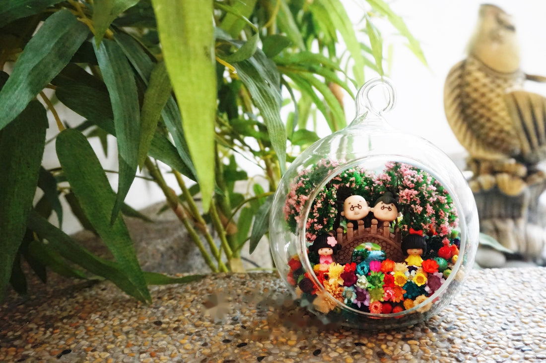 Family in Garden preserved flower terrarium