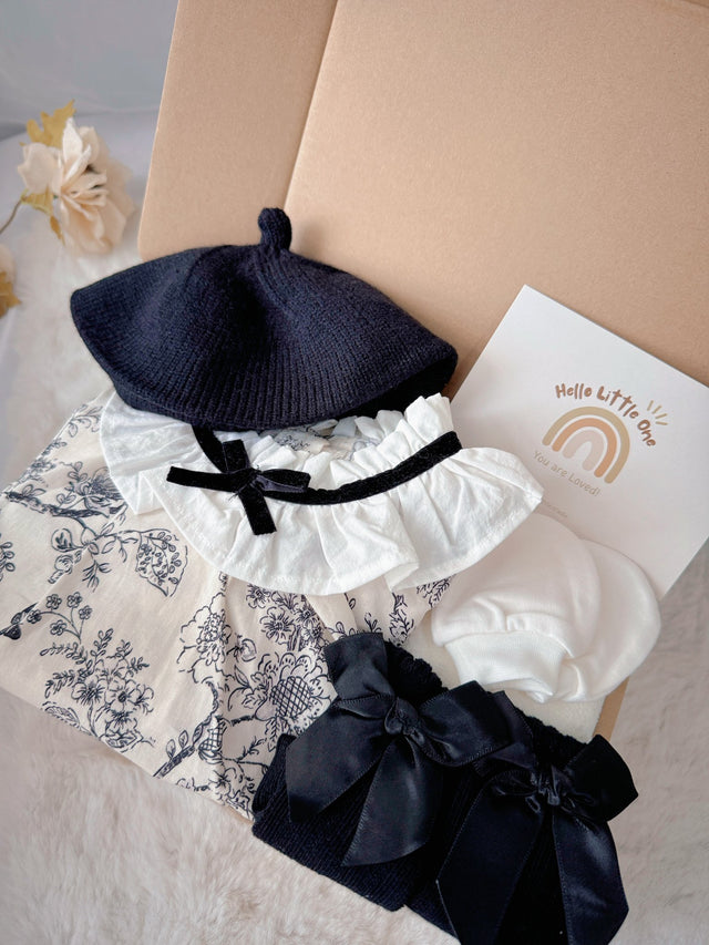 French Blossom standard baby gift box with floral romper with ruffled collar and black beret