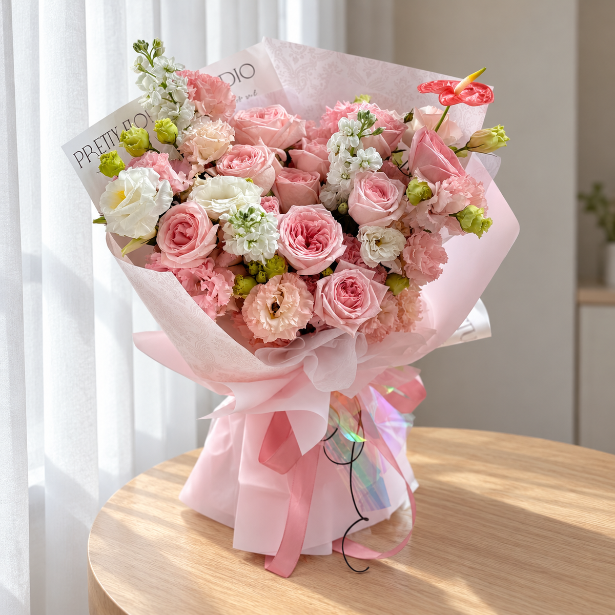 Élise Pink Rose, Stock & Eustoma Bouquet — full product photograph in natural window light.
