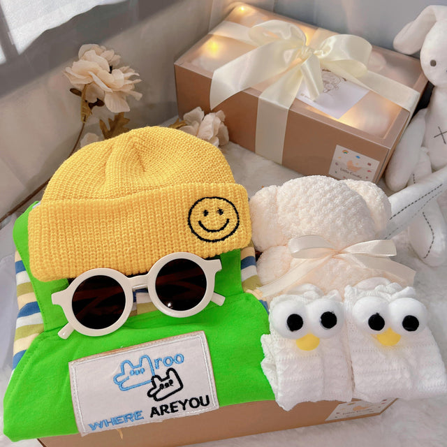 Little Green Sprout classic baby gift box with green striped romper with yellow hat
