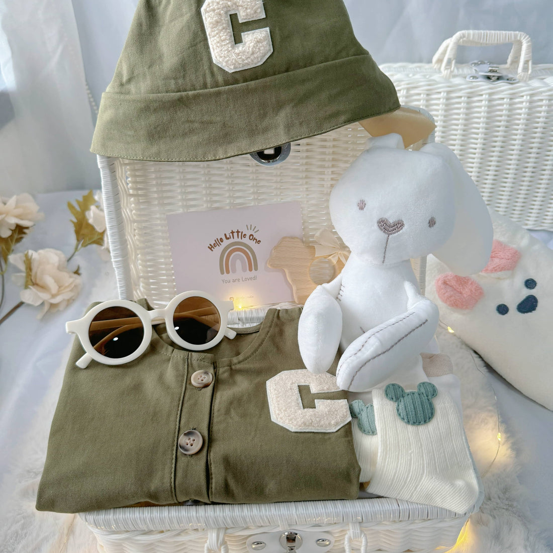 Little Tiny Trooper premium baby gift set in a rattan basket with army-green romper