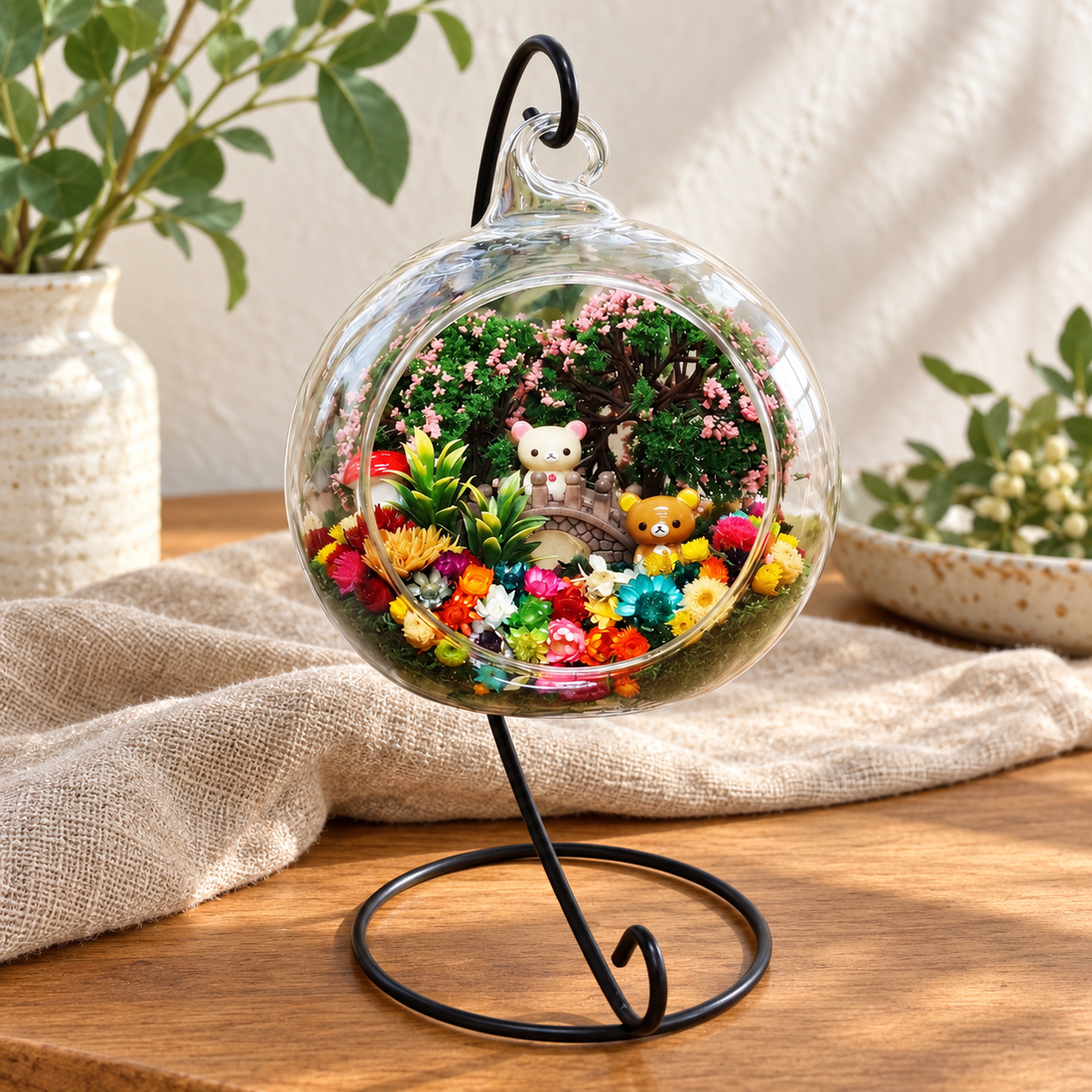 Relaxed Bear Preserved Flower Terrarium styled in a natural home setting with clear glass and product details