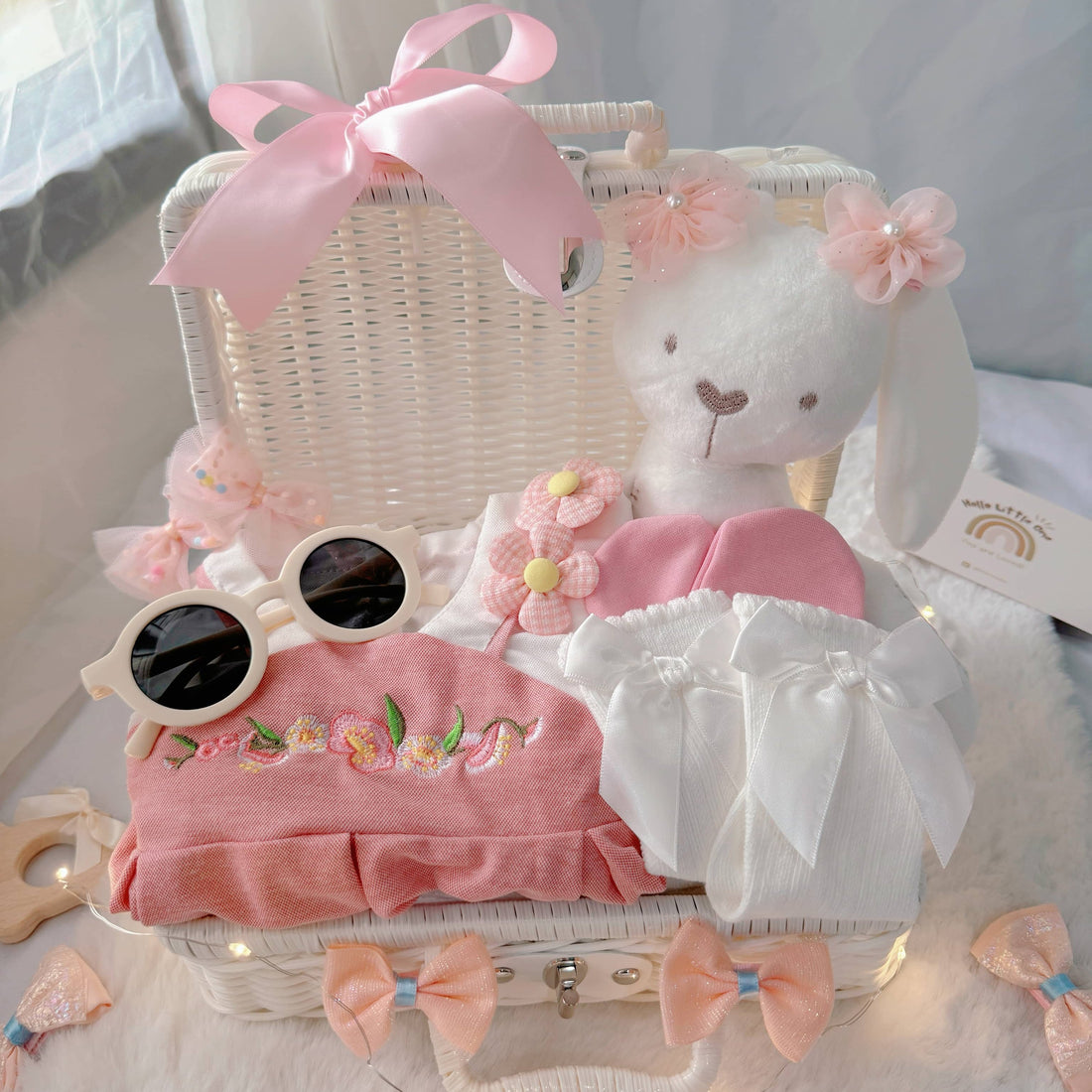 Pink Hanbok premium baby gift set in a rattan basket with pink Hanbok-style romper
