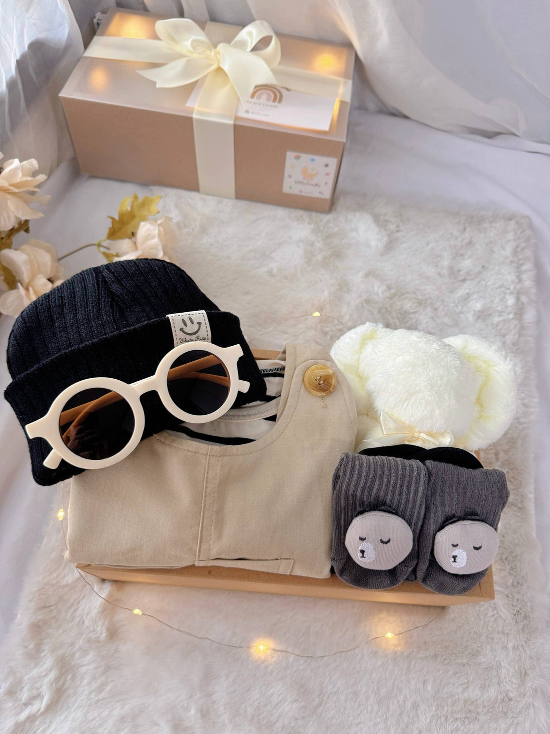 Tiny Trendsetter classic baby gift box with khaki overalls with striped top and black beanie