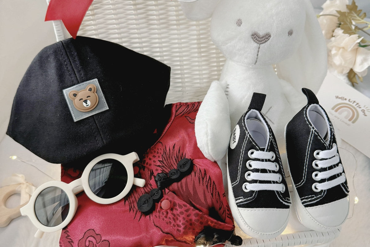 Little Cradle Baby Boy Red Hanfu full moon gift set in a white rattan basket with red hanfu, hat, sneakers and plush bunny