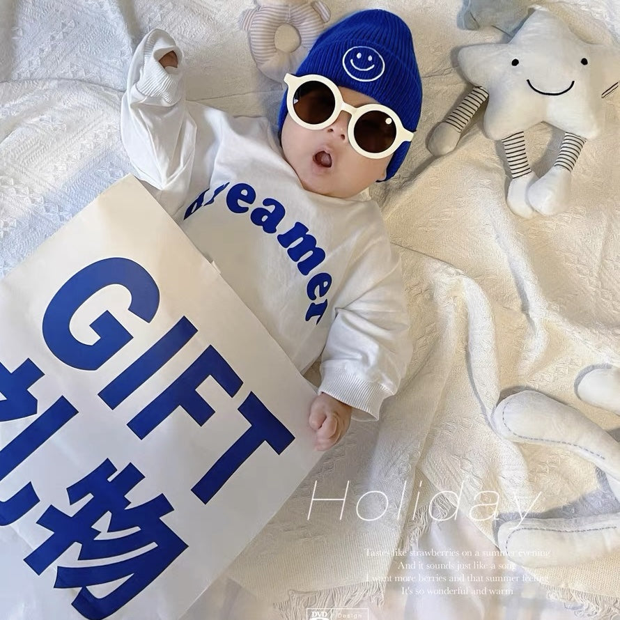 Baby wearing the Baby On Fleek blue owl &