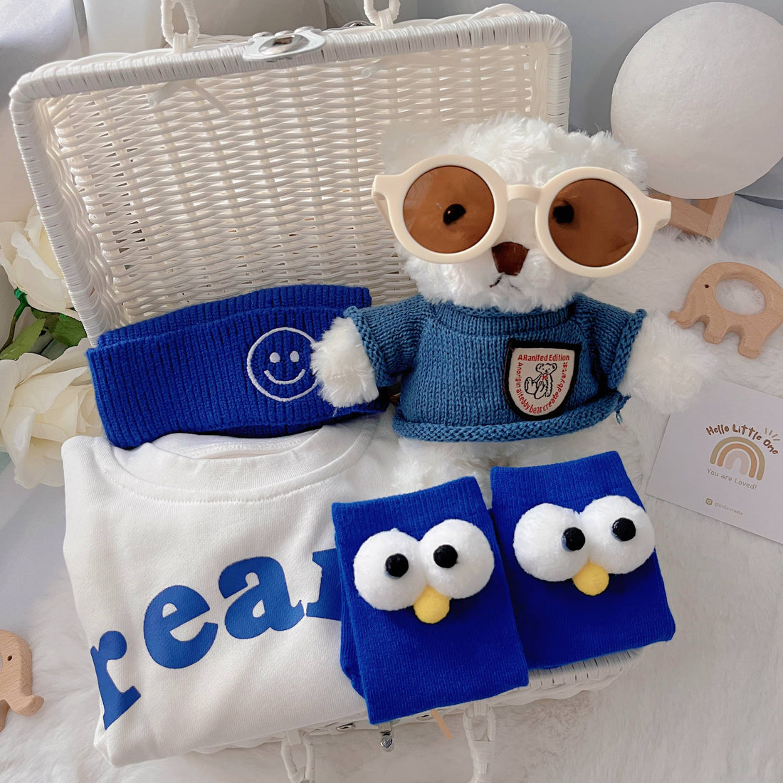 Baby On Fleek premium baby gift set in a rattan basket with blue owl &
