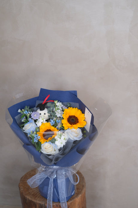 Caps & Blooms Bouquet by Bamboo Green Florist, Penang