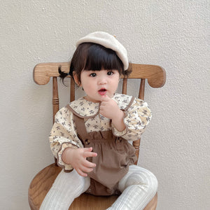 Baby girl in Autumn Princess romper – cosy newborn gift set