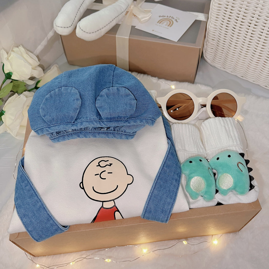 Baby Charlie Brown classic baby gift box with cartoon-style romper