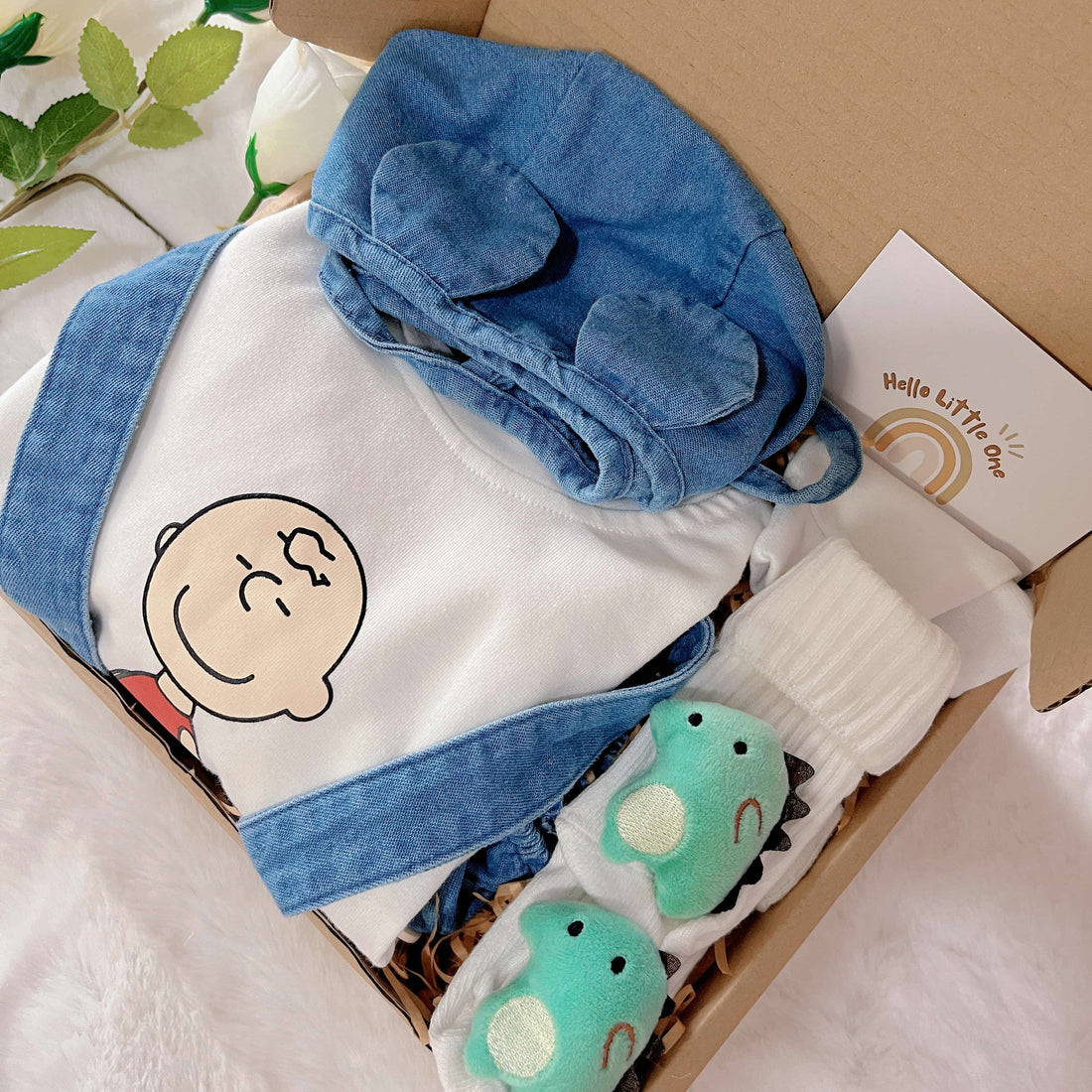 Baby Charlie Brown standard baby gift box with cartoon-style romper