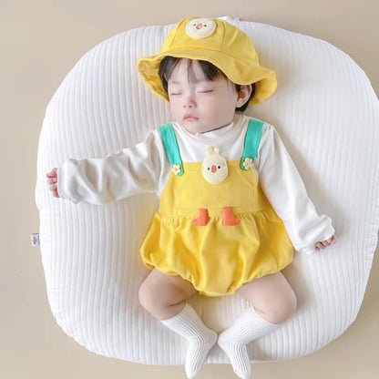 Baby wearing the Baby Chicky yellow chick romper