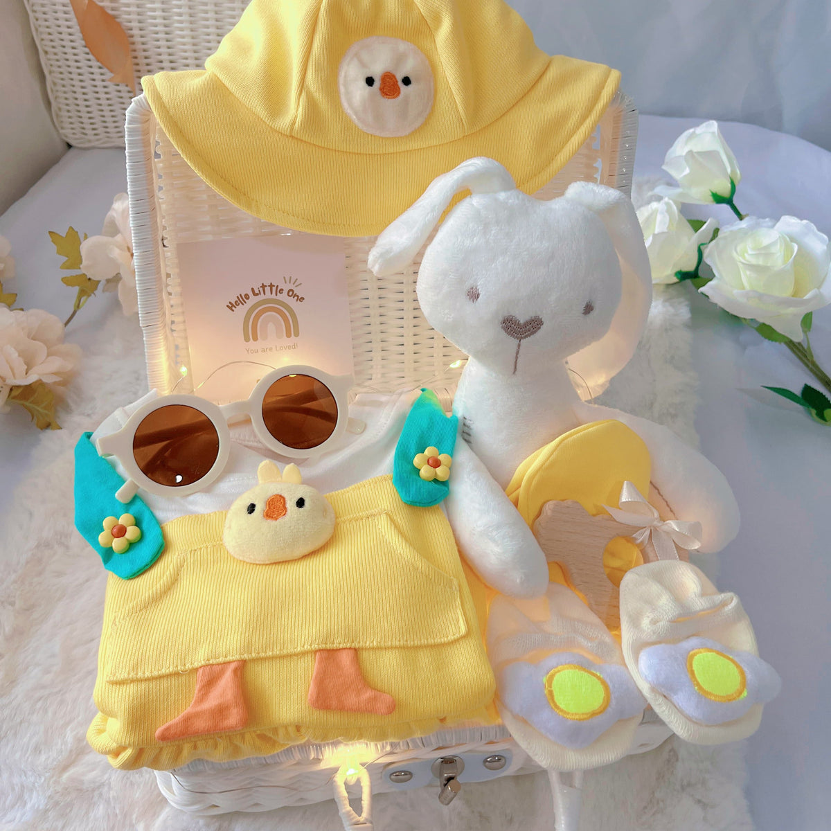Baby Chicky premium baby gift set in a rattan basket with yellow chick romper