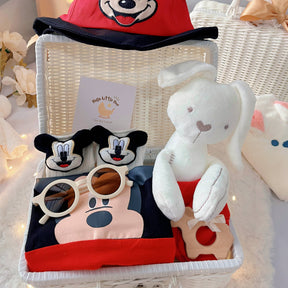 Baby Mickey premium baby gift set in a rattan basket with red and black mouse-themed romper