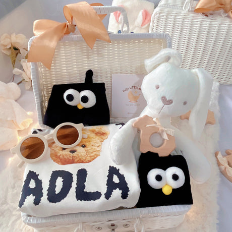 Baby Streetstyle premium baby gift set in a rattan basket with black-and-white streetwear romper