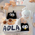 Baby Streetstyle premium baby gift set in a rattan basket with black-and-white streetwear romper