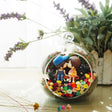 Bench Couple with Flowers preserved flower terrarium