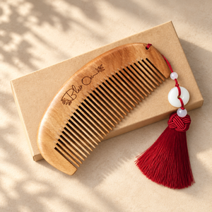 Personalised sandalwood comb with engraved name and tassel
