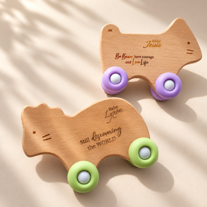 Personalised silicone and wood baby motor skills training toy with engraved name