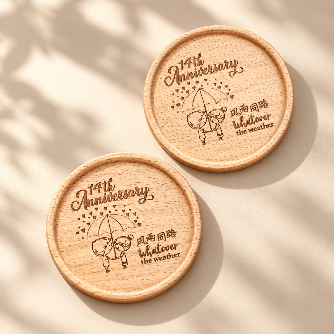 Two personalised square beech wood coasters with engraved names