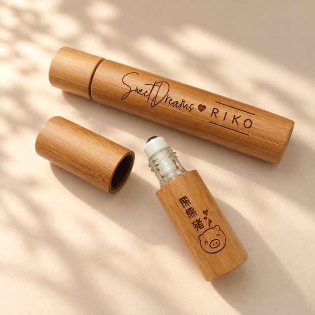 Personalised 5ml bamboo and glass roll-on bottle with engraved name