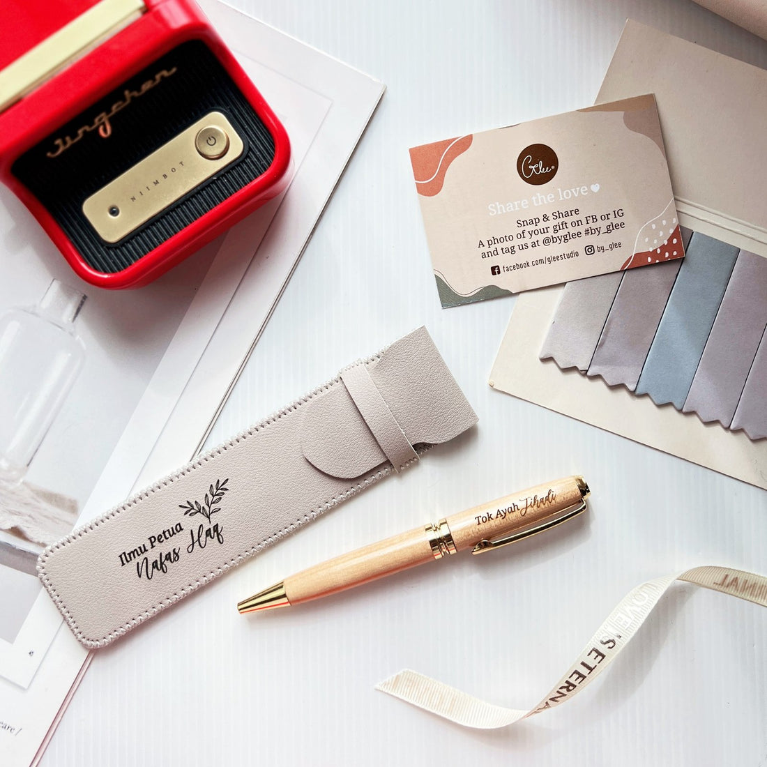 Personalised wooden pen with engraved name and grey leather pouch, By Glee