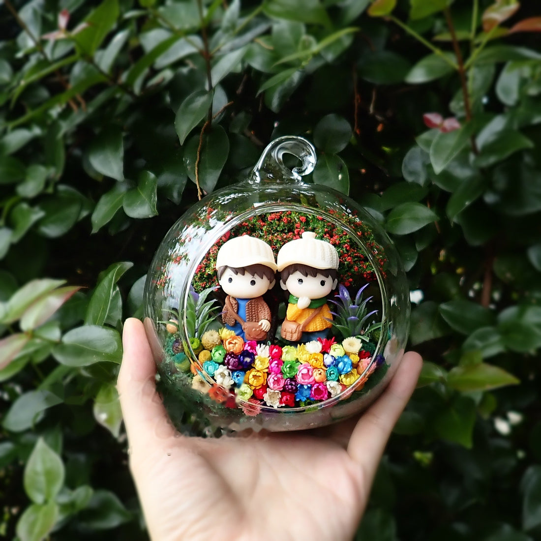 Chubby Couple in Orange preserved flower terrarium