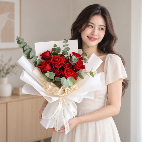 Crimson Romance Bouquet — illustrative lifestyle image with an adult