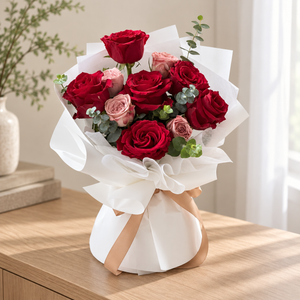 Beloved Ruby Red & Cappuccino Rose Bouquet — full product photograph in a softly lit neutral interior.