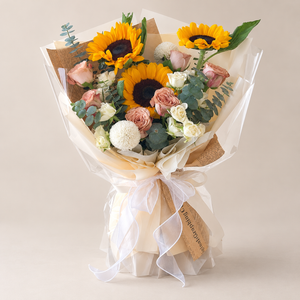 Saffron Cappuccino Sunflower & Rose Bouquet — professional studio product photograph.