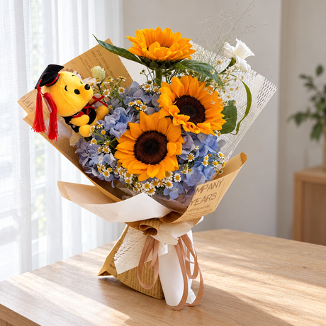 Scholar Sunflower Graduation Bouquet with Bear — full product photograph in natural window light.