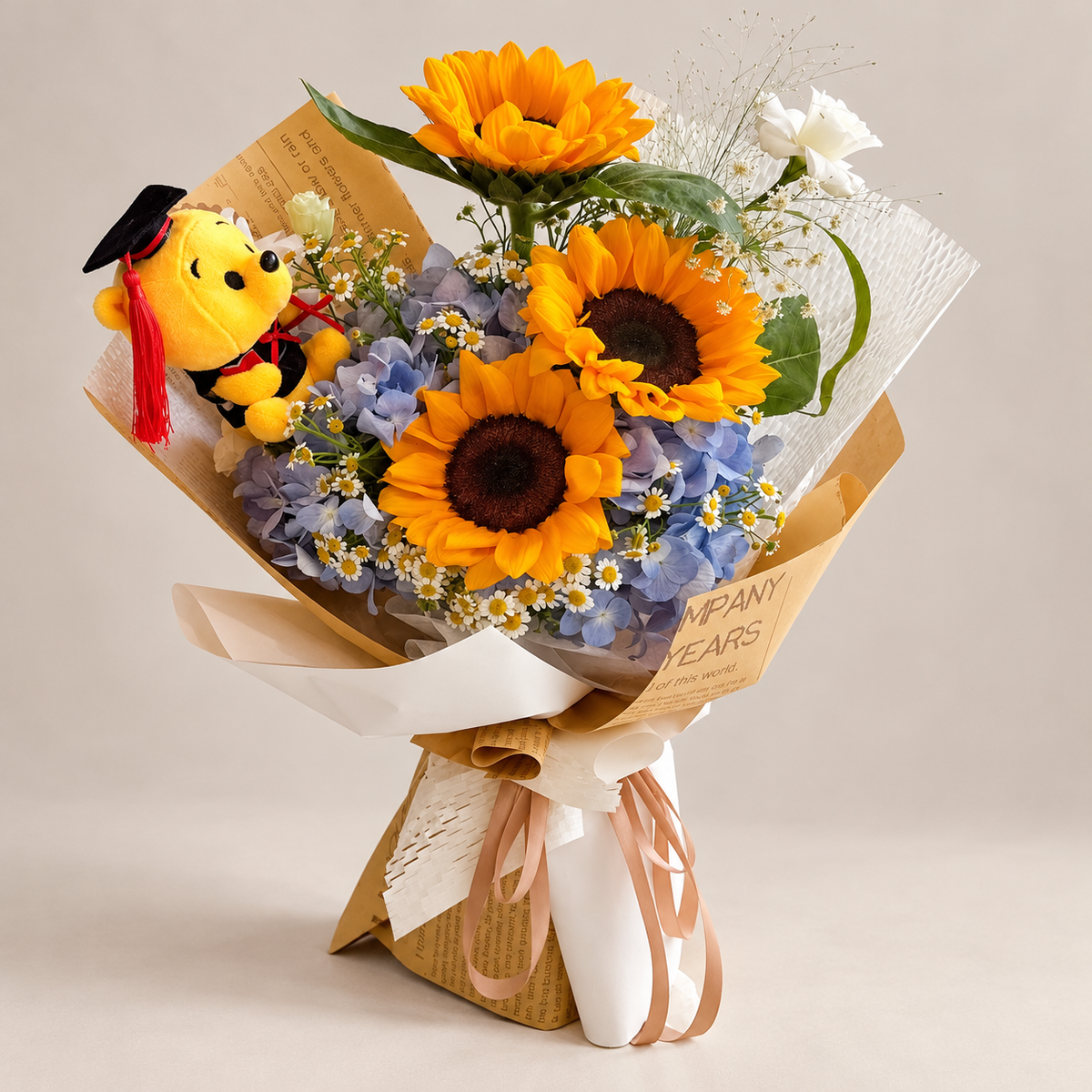 Scholar Sunflower Graduation Bouquet with Bear — professional studio product photograph.