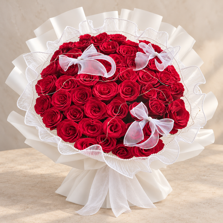 The True Love – 52 Red Roses Bouquet — alternate full product photograph in a neutral interior.