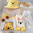 Honey Bunch premium baby gift set in a rattan basket with yellow honey-bear romper with hat and socks