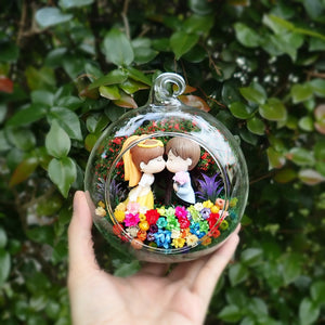Kissing Couple in Yellow preserved flower terrarium