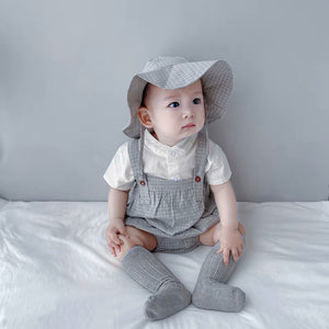 Baby wearing the Korean Baby Oppa grey and white Korean-style romper