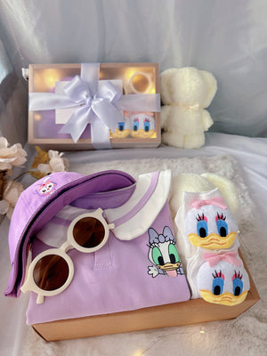 Little Daisy classic baby gift box with lilac duck-collar romper with bucket hat