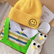 Little Green Sprout standard baby gift box with green striped romper with yellow hat