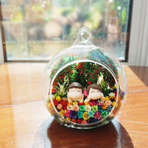 Lying Down Couple preserved flower terrarium