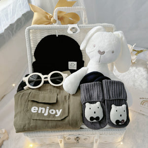 Mini Militia Green premium baby gift set in a rattan basket with black romper with green jacket and hat