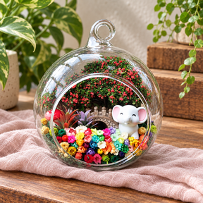 Big Grey Elephant Preserved Flower Terrarium styled in a natural home setting with clear glass and product details