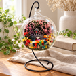 Cartoon Cat Preserved Flower Terrarium styled in a natural home setting with clear glass and product details