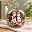 Chinese Style Couple Preserved Flower Terrarium styled in a natural home setting with clear glass and product details