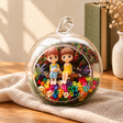 Couple on Bench Preserved Flower Terrarium styled in a natural home setting with clear glass and product details