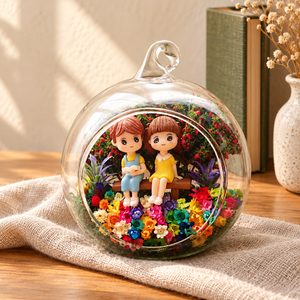 Couple on Bench Preserved Flower Terrarium styled in a natural home setting with clear glass and product details