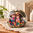 Couple on the Moon Preserved Flower Terrarium styled in a natural home setting with clear glass and product details