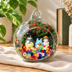 Grey and Blue Figures with Girl Terrarium styled in a natural home setting with clear glass and product details